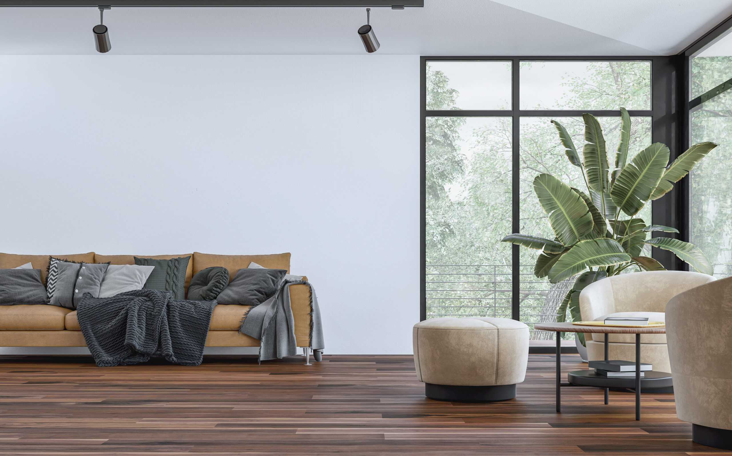 Stijlvol interieur met kunstplant naast moderne bank in lichte woonkamer