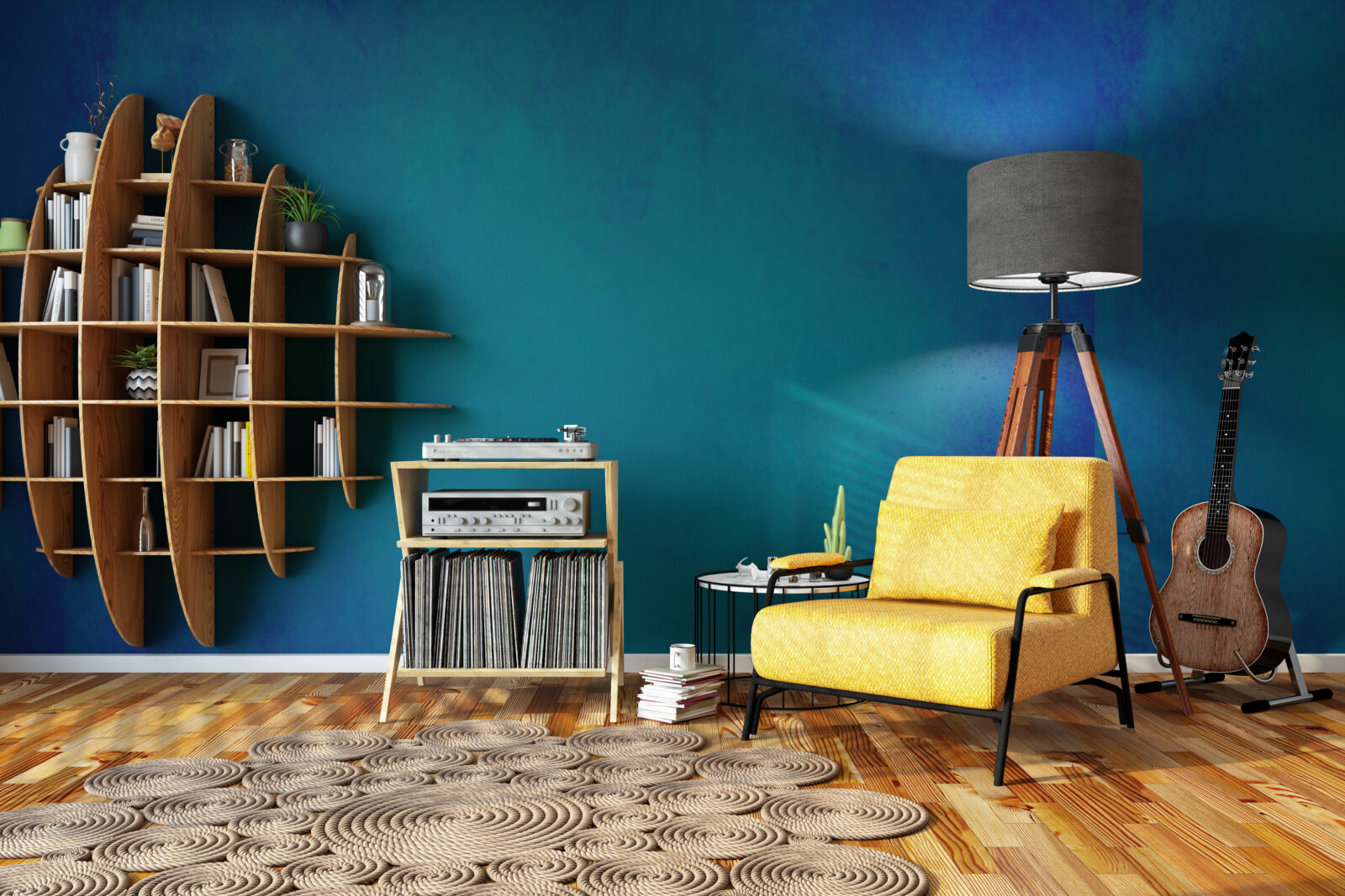 Ovale houten boekenkast aan blauwe muur met gele fauteuil en vintage interieuraccenten