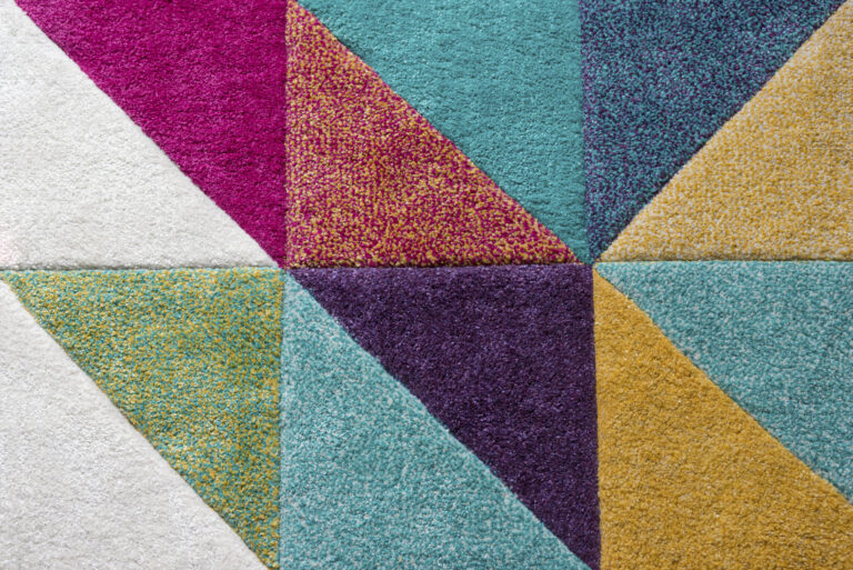 Kleurrijke geometrische tapijttegels in modern patroon