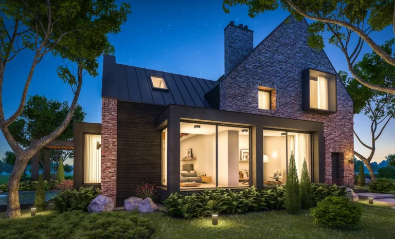 Woning met buitenverlichting in de avond